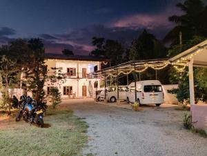 a group of motorcycles parked in front of a building at Lodge in Resolute in Dambulla