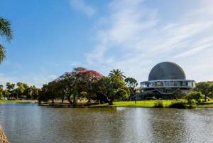 a large building sitting on top of a body of water at Espectacular departamento en Palermo in Buenos Aires