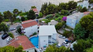 an aerial view of a house next to the water at Dilans apartments by the sea in Bar