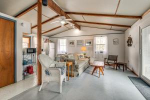 a living room with a couch and a table at Steps to St Albans Bay! Basecamp w/ Grill in Saint Albans Bay +16 photos