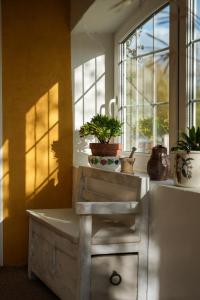 a bathroom with a sink and a window at Maison semi-troglo - Proche Chenonceaux - Amboise - La Caburoche de Charlemagne in Civray-de-Touraine