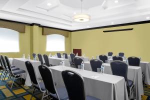 a conference room with white tables and chairs at Best Western Plus Miami-Doral/Dolphin Mall in Miami