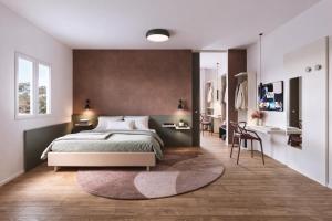 a bedroom with a large bed and a bathroom at Hotel Sayonara in Milano Marittima +87 photos