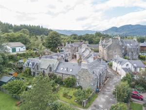 an aerial view of a village with houses at 2 Bed in Birnam Dunkeld oc-ca266 in Birnam