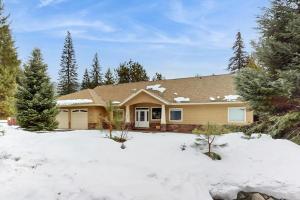 a house with snow in front of it at Leavenworth Mountain, Golf Course, 3br 4 ba in Leavenworth