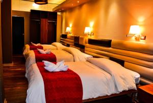Katil atau katil-katil dalam bilik di Hotel Royal Qosqo
