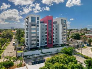 an aerial view of buildings in a city at Stylish Condo with Rooftop Pool and Gym in Kingston