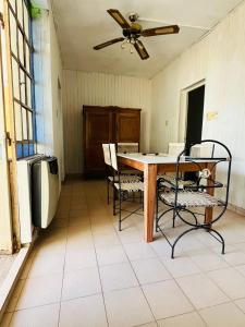 a dining room with a table and chairs at la casita del altillo in San Francisco