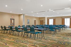a conference room with tables and chairs in it at Best Western Big Spring Lodge in Neosho +46 photos