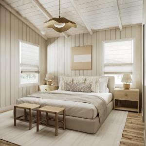 a bedroom with a large bed and a ceiling at Townie 1 - The Ivy by Juniper Holiday + Home in Union Pier