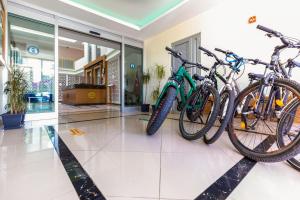 two bikes are parked in a lobby at The Suites in Antalya