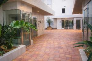 an empty hallway of a building with a courtyard at La Loma in Águilas