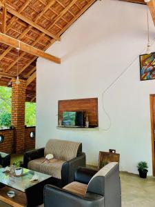 a living room with a couch and a table at FA Resort in Panama