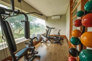 a gym with two exercise bikes in a room at Colina Pousada SPA in Fernando de Noronha