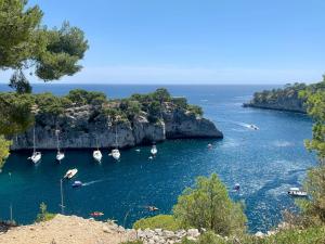 a group of boats in a body of water at Mistral Studio in Cassis +6 photos