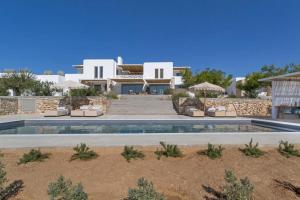 a view of a villa with a swimming pool at Callirhoe 180 in Poros