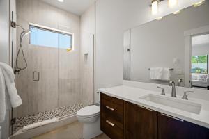 a bathroom with a sink and a toilet and a shower at 18112-2 Forestbrook Loop in Bend