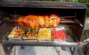 a large turkey is being cooked in an oven at Apartmány u Mravence in Starý Petřín