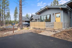 a house with a porch and a driveway at 18136-2 Forestbrook Loop in Bend