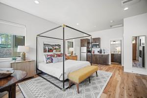 a bedroom with a bed with a metal frame at 18145-2 Forestbrook Loop in Bend