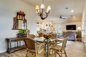 a dining room and living room with a table and chairs at Backyard Bungalow w/ Pool & Country Views in Argyle