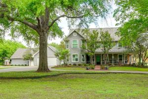 a house with a tree in front of it at Backyard Bungalow w/ Pool & Country Views in Argyle