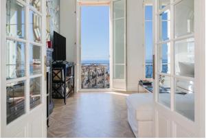 a living room with a view of the ocean at Luxury Penthouse Villa Belle Epoque Monaco GP in Cap d'Ail