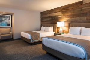 Postel nebo postele na pokoji v ubytování Hotel Azure