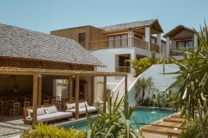 an image of a villa with a swimming pool at Villa Tapi in Jericoacoara
