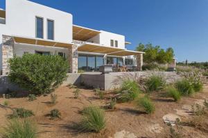 a house on the beach with plants at Callirhoe 180 in Poros