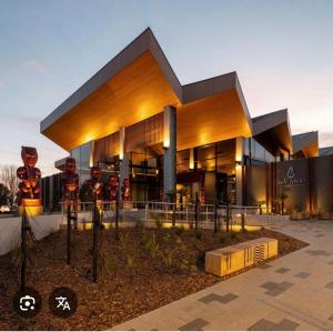 a large building with a large building with at Skyline SkyRides Premium Property, see host info for pets in Rotorua
