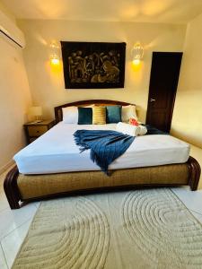 a bedroom with a large bed in a room at Villa del Sol #1 in La Laguna