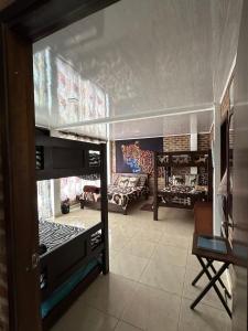 a room with a living room with a tiger painting on the wall at Casa Africa in Calima +26 photos