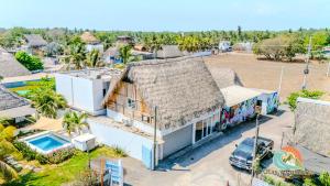 an aerial view of a house with a roof at Playa de la Fuente in El Paredón Buena Vista +30 photos