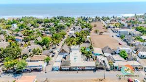 an aerial view of a resort with the ocean at Playa de la Fuente in El Paredón Buena Vista