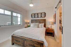 a bedroom with a large bed and a window at Downtown WP Loft 14 I Huge Hot Tub I Great Views I Additional Bunk Area I Activity Program in Winter Park