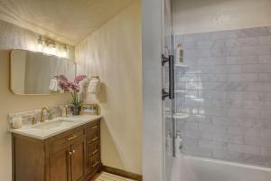 a bathroom with a sink and a shower at The Gold Hill Chalet in Keystone +35 photos