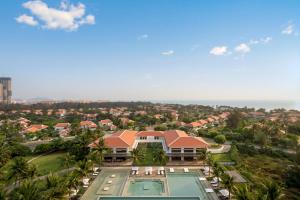 an aerial view of a resort with a swimming pool at The Bada studio apartment - ocean view in Danang