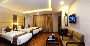 Voodi või voodid majutusasutuse Kathmandu Grand Hotel toas