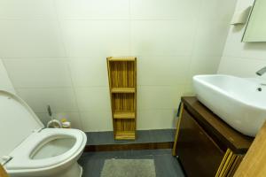 a bathroom with a sink and a toilet at BNM Base Camp - Ulaanbaatar in Ulaanbaatar +18 photos