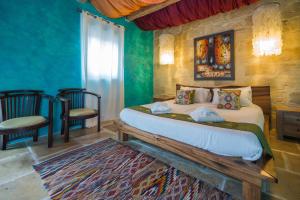 Postel nebo postele na pokoji v ubytování Chapel 5 Boutique Suites B&B