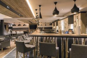 Χώρος καθιστικού στο Hotel des Alpes