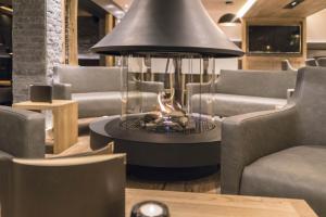 Χώρος καθιστικού στο Hotel des Alpes