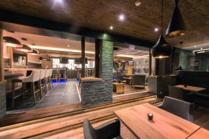 Χώρος καθιστικού στο Hotel des Alpes