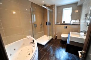 A bathroom at Frensham Pond Country House Hotel & Spa 