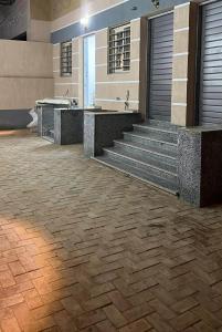 a bathroom with stairs and a sink and a tub at Luxury Studio in 6october in 6th Of October