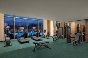 a gym with cardio equipment in a building at Vivanta Ekta Nagar in Kevadia