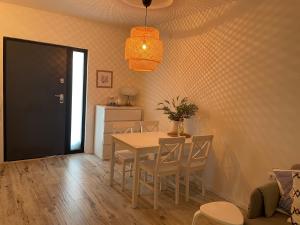 a dining room with a table and chairs at David 73 in Split