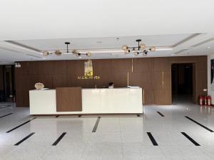a lobby with a reception desk in a building at Ha Long 2BR Apartment - Spacious & Modern - Near Center in Ha Long +34 photos