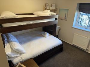 a bedroom with two bunk beds in a room at Mark II 3W in Mount Buller +10 photos